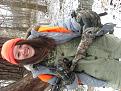 My daughter, her rifle and a dead snake she found.